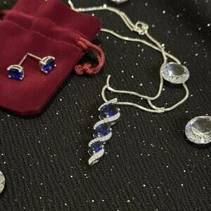 Sterling Silver Created Blue Sapphire & White Topaz S Design Pendant